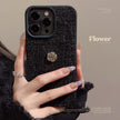 Woolen camellia Apple 16 mobile phone case 17promax autumn and winter 15 is suitable for iPhone13 Xiaoxiangfeng 11 generation